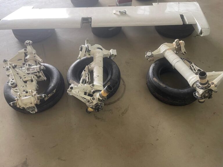 Three aircraft landing gear assemblies laid out for overhaul at DJSD